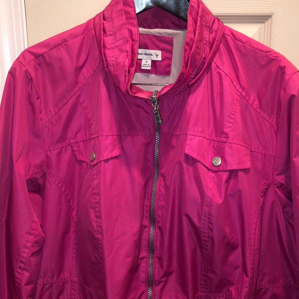 Zip up wind jacket; bright fuschia pink. Cute back waist detail.